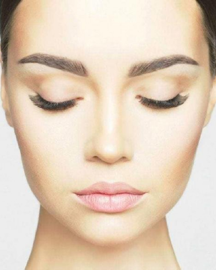 picture of a dermalux model looking radiant after treatment