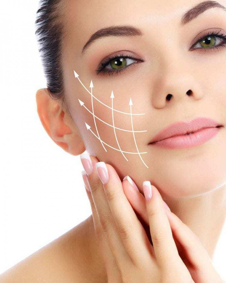picture of a young woman with lifting contours graphic overlayered on her face to illustrate what facial treatments can do