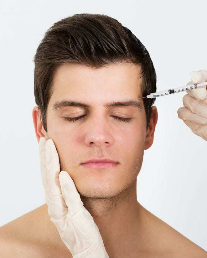 picture of a man to illustrate what botox treatments can do around the temples for tension headaches