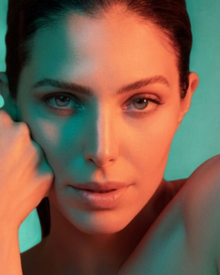 photo of Lumecca model staring into the camera after treatment