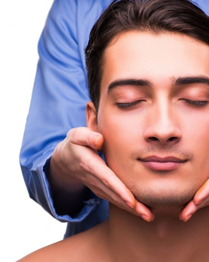 Facial consultation discussing Radiesse treatment options for a man